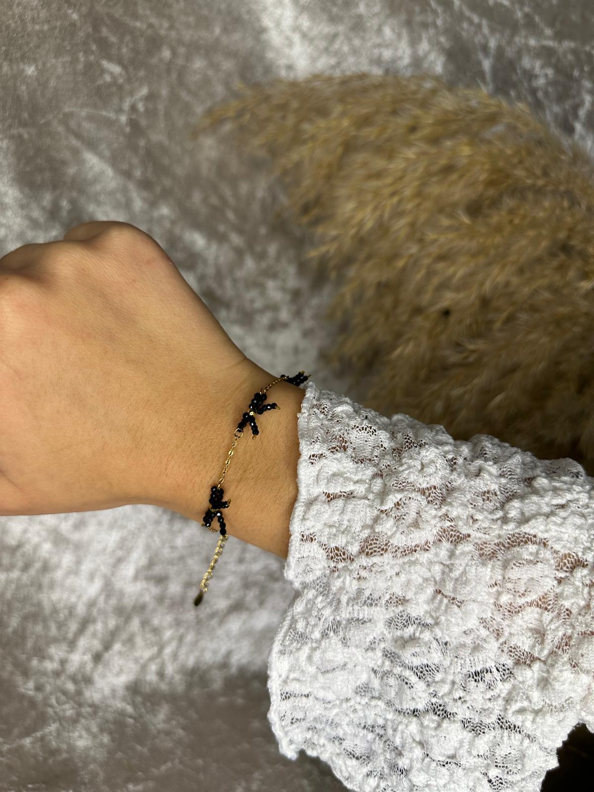 Armband met kralenstrikken - goud